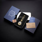 Seagull 1963 Moonphase Cream with its navy sleeve, tin box, hang tag and papers laid out on black