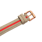 Seagull 1963 Bronze Lume beige nylon strap close-up, red centre stripe, cream stitching, bronze-tone star buckle