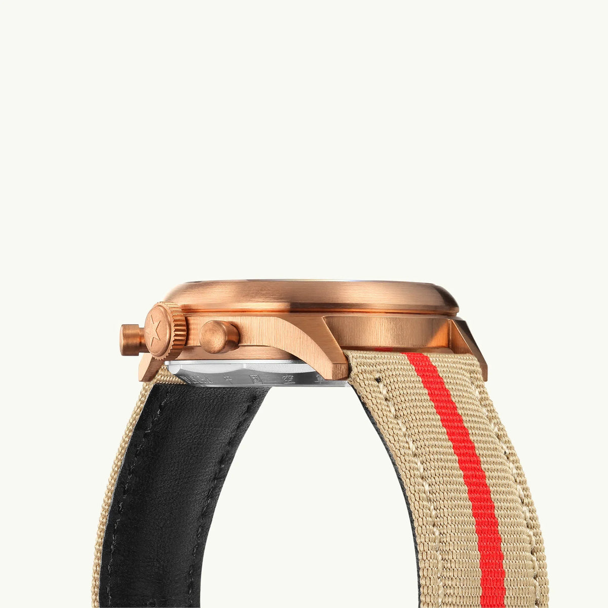 Seagull 1963 Bronze Lume case profile, steel caseback protruding, beige strap on one lug and black leather on the other
