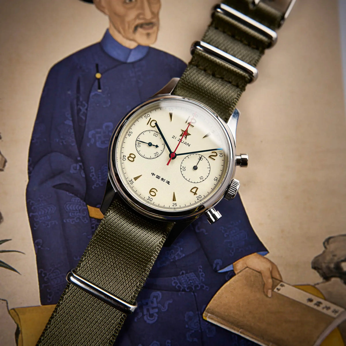 Seagull 1963 Air Force Cream 40mm angled on a vintage Chinese book, blued hands and red star
