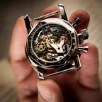 Seagull 1963 Blue Panda 42mm caseback held in fingers, ST19 movement with blued screws behind glass
