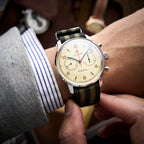 Seagull 1963 Air Force Cream 42mm on the wrist under a striped shirt cuff and grey jacket sleeve