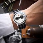 Seagull 1963 White Panda Sport 42mm on the wrist under a white shirt cuff, striped nylon strap