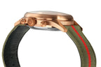 Seagull 1963 Bronze Lume 40mm side profile, raised boxed crystal above the brushed bronze flank