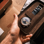 Seagull 1963 Icon II Blue inside a brown suede zip travel case with a spare strap slot