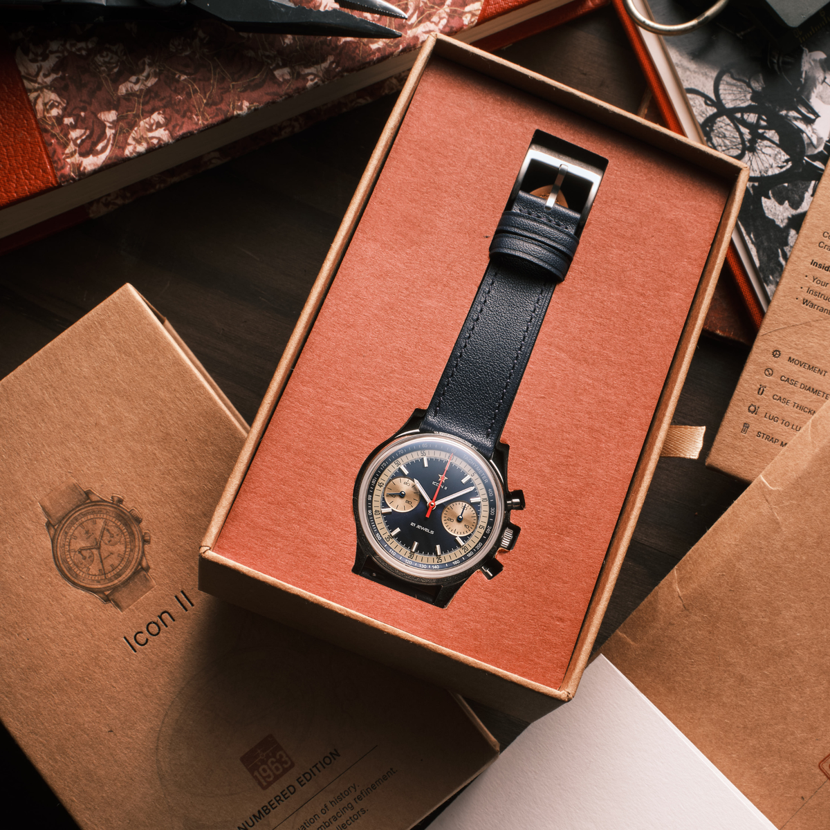 Seagull 1963 Icon II Blue sitting in the orange tray of the kraft presentation box