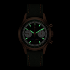 Seagull 1963 The Icon bronze in the dark, hour batons and the hour and minute hands glowing green